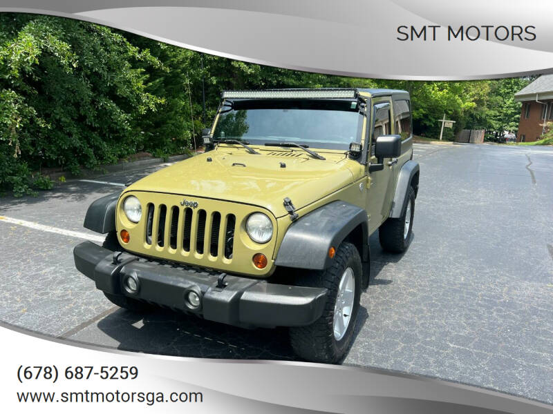 2013 Jeep Wrangler for sale at SMT Motors in Roswell GA