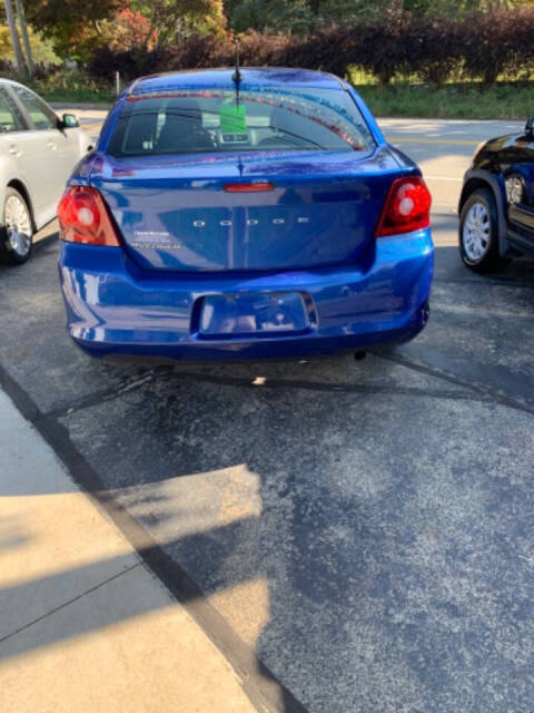 2013 Dodge Avenger for sale at Chuckie Bizzarro's Fleetwing Auto in Erie, PA