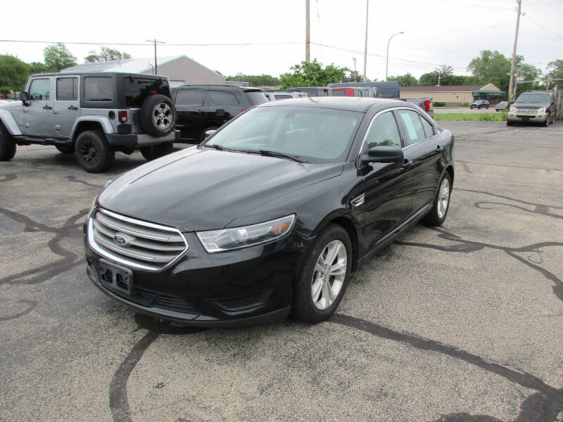 Used 2015 Ford Taurus SE with VIN 1FAHP2D87FG208585 for sale in Urbana, IL