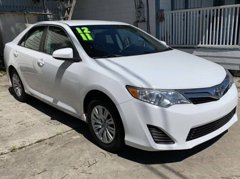 2012 Toyota Camry for sale at De La Paz Auto Sales Inc. in Houston TX