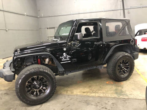 2012 Jeep Wrangler for sale at EA Motorgroup in Austin TX
