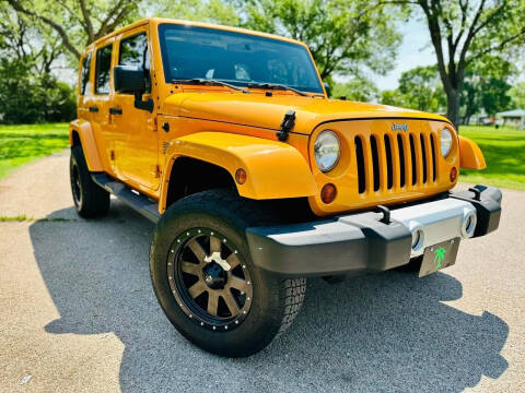 2012 Jeep Wrangler Unlimited for sale at Island Auto in Grand Island NE