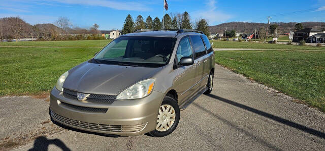 2004 Toyota Sienna for sale at Art's Used Cars in Winfield, WV