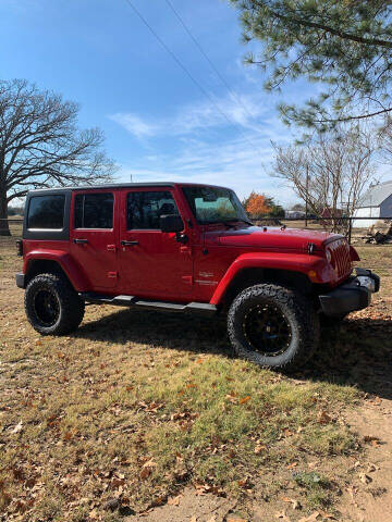 2012 Jeep Wrangler Unlimited for sale at BARROW MOTORS in Campbell TX