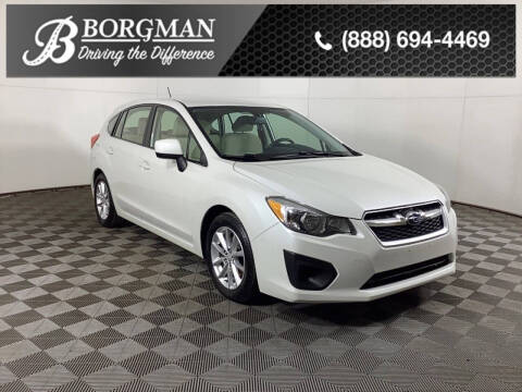 2014 Subaru Impreza for sale at BORGMAN OF HOLLAND LLC in Holland MI