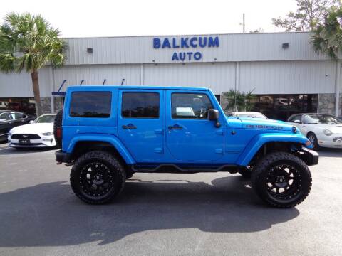 2016 Jeep Wrangler Unlimited for sale at BALKCUM AUTO INC in Wilmington NC