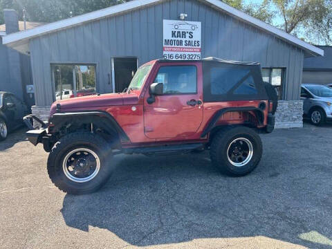 2011 Jeep Wrangler for sale at KARS MOTORS in Wyoming MI