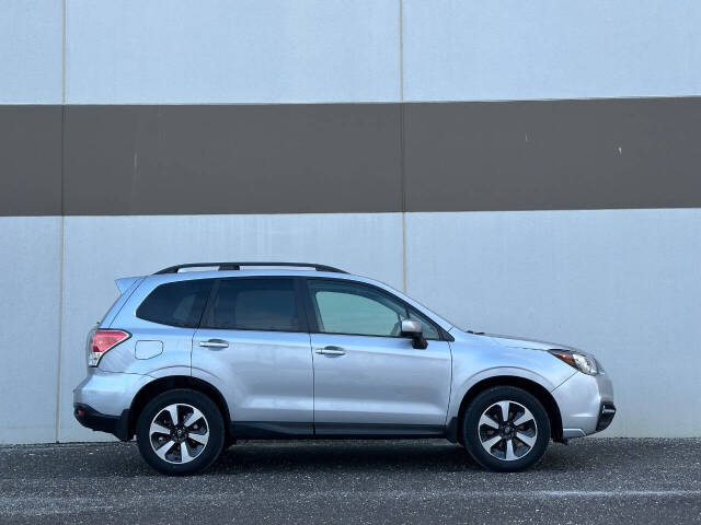 2018 Subaru Forester for sale at Phoenix Motor Co in Romulus, MI