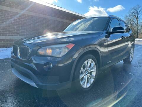 2013 BMW X1 for sale at Minnix Auto Sales LLC in Cuyahoga Falls OH
