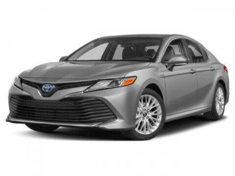 2020 Toyota Camry Hybrid for sale at HILAND TOYOTA in Moline IL