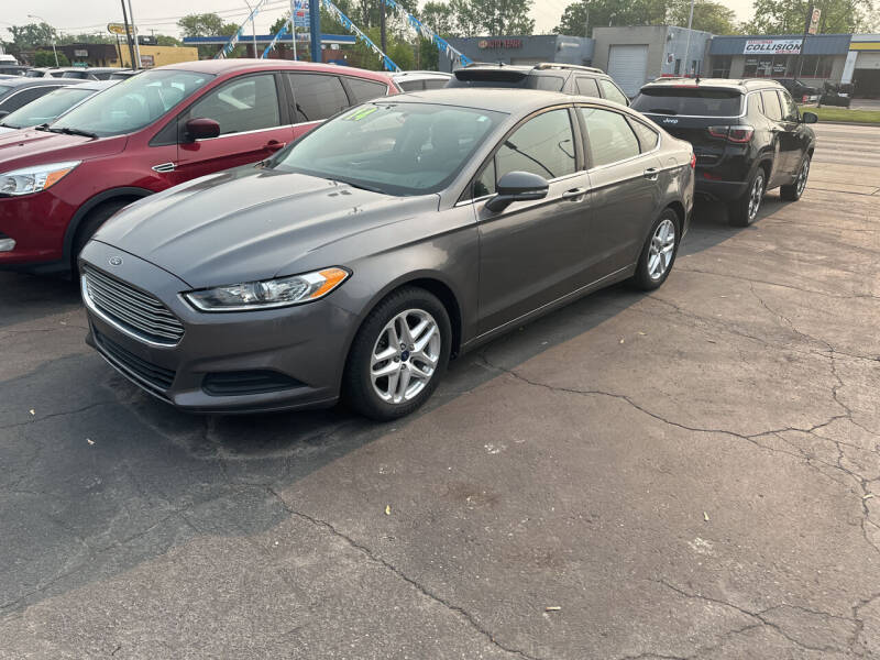 2014 Ford Fusion for sale at Lee's Auto Sales in Garden City MI