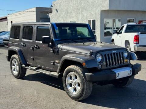 2014 Jeep Wrangler Unlimited for sale at Adam's Cars in Mesa AZ