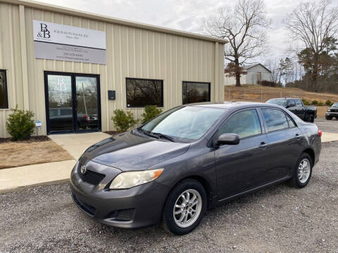 2009 Toyota Corolla for sale at B & B AUTO SALES INC in Odenville AL
