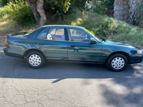 green 1996 camry ad