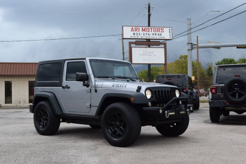 2015 Jeep Wrangler for sale at ARI Motors in Houston TX