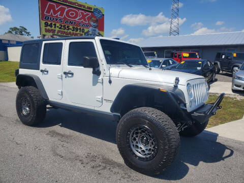 2013 Jeep Wrangler Unlimited for sale at Mox Motors in Port Charlotte FL