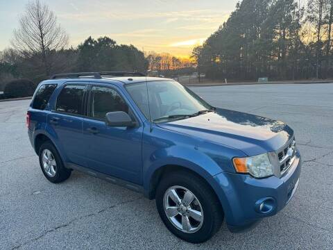 2009 Ford Escape for sale at Two Brothers Auto Sales in Loganville GA