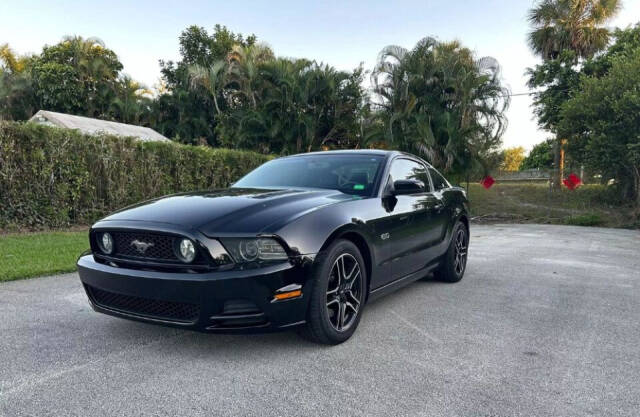 2013 Ford Mustang for sale at THE KAR COLLECTION in DAVIE, FL