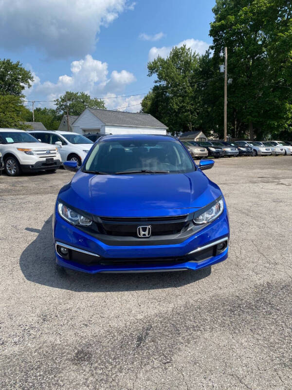 Used 2021 Honda Civic LX with VIN 2HGFC2F60MH559009 for sale in Hilliard, OH