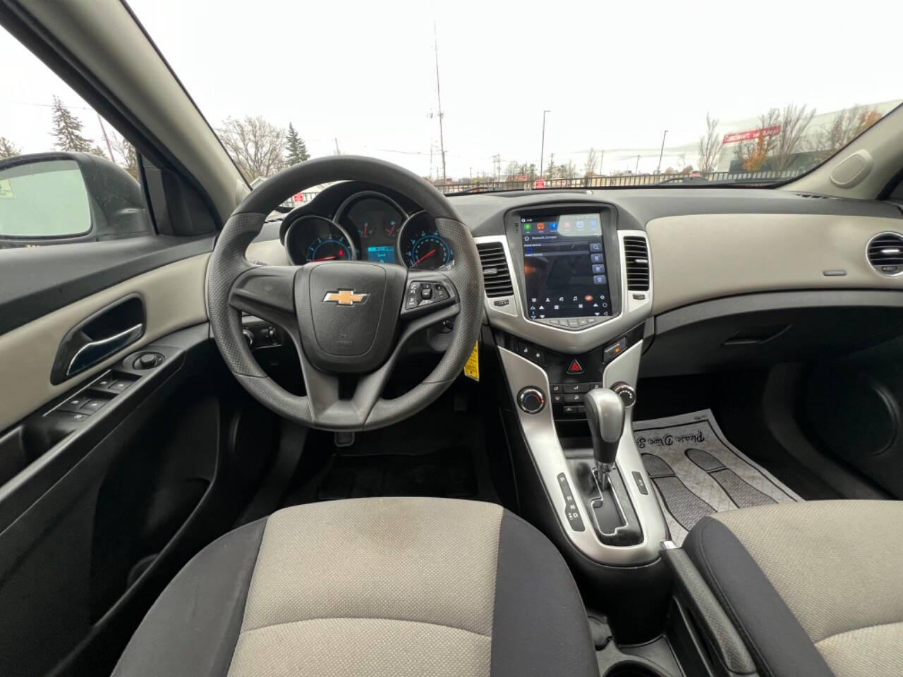 2014 Chevrolet Cruze for sale at Carventure in Lansing, MI