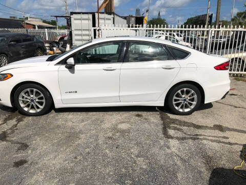 2019 Ford Fusion Hybrid for sale at Guru Auto Sales in Miramar FL