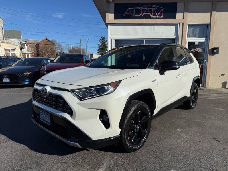 2021 Toyota RAV4 Hybrid for sale at ADAM AUTO AGENCY in Rensselaer NY