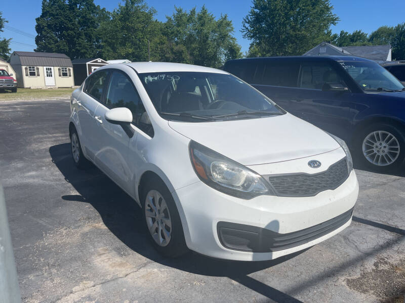 2013 Kia Rio for sale at HEDGES USED CARS in Carleton MI