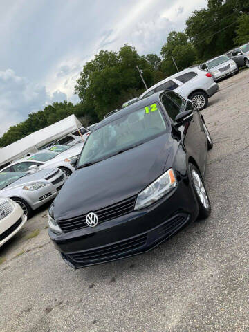 2012 Volkswagen Jetta for sale at Autocom, LLC in Clayton NC