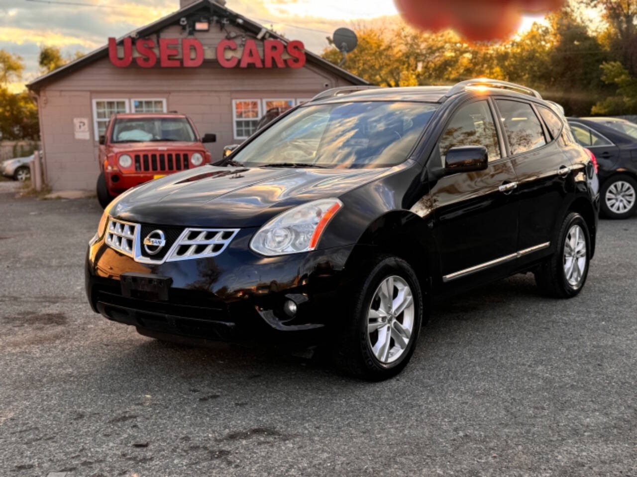 2013 Nissan Rogue for sale at Walkem Autos in District Heights, MD