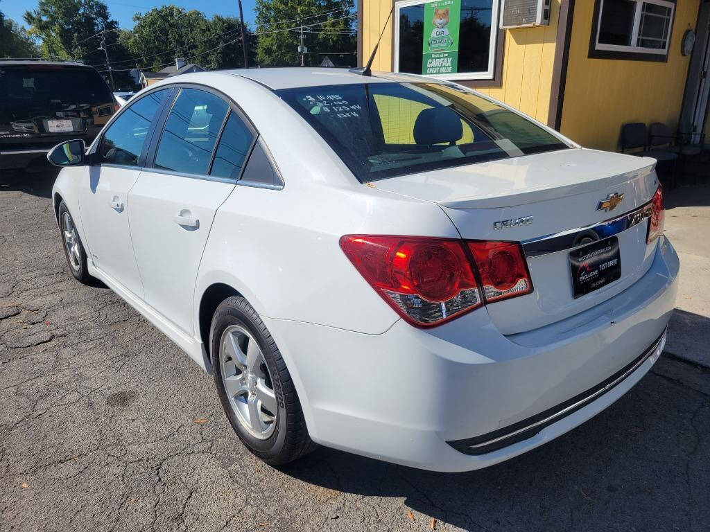 2013 Chevrolet Cruze for sale at DAGO'S AUTO SALES LLC in Dalton, GA