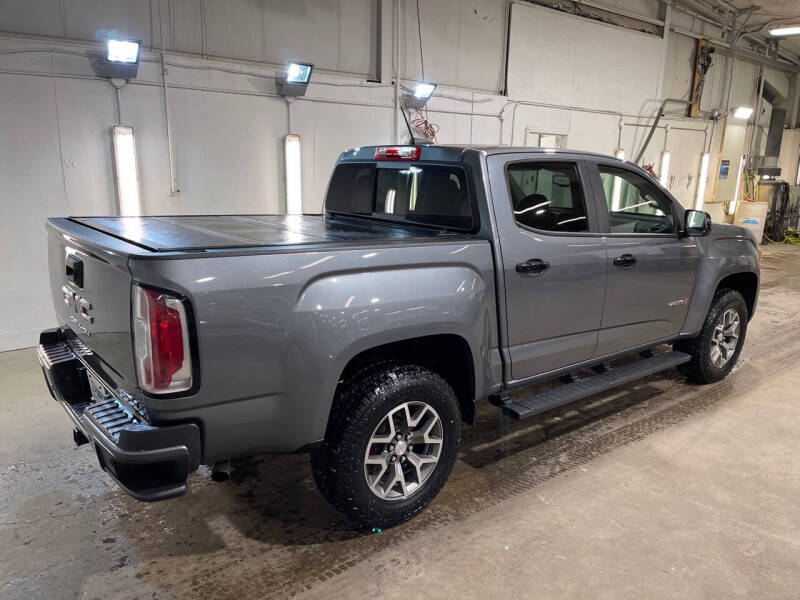 Used 2021 GMC Canyon AT4 with VIN 1GTG6FEN9M1103289 for sale in Sioux Falls, SD