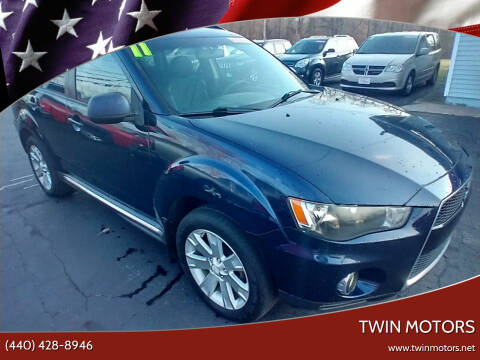 2011 Mitsubishi Outlander for sale at TWIN MOTORS in Madison OH