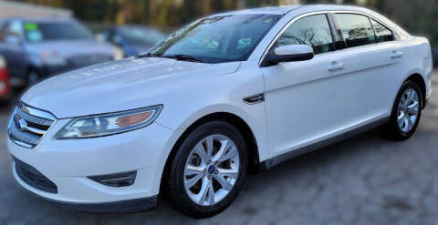 2011 Ford Taurus for sale at HARDIN'S AUTO LLC in Jonesboro GA