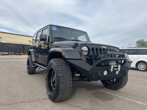 2013 Jeep Wrangler Unlimited for sale at Rollit Motors in Mesa AZ