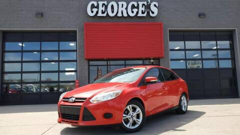 2014 Ford Focus for sale at George's Used Cars in Brownstown MI