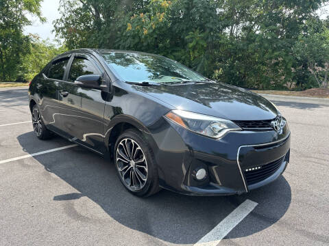 2016 Toyota Corolla for sale at Noble Auto in Hickory NC