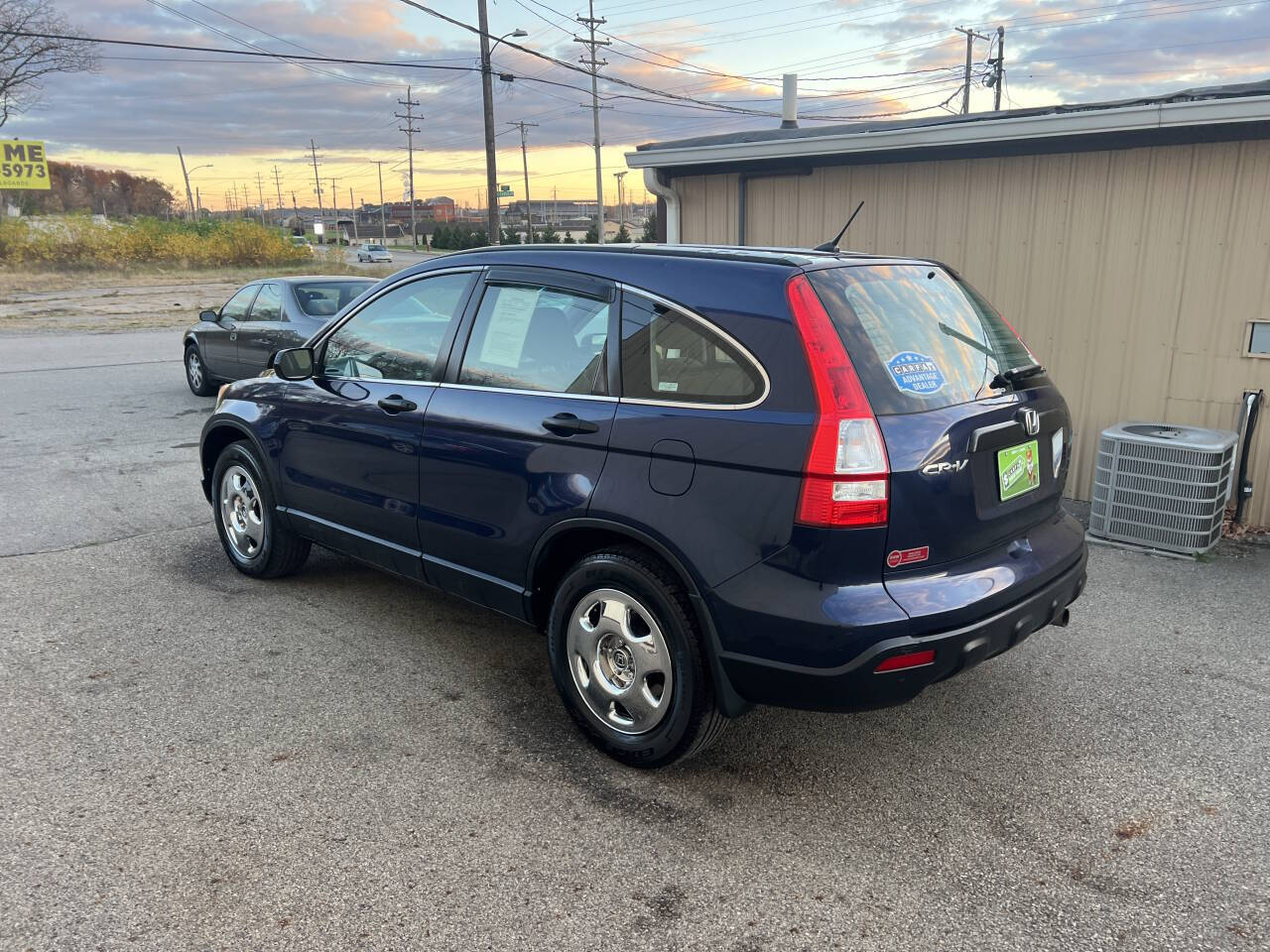 2009 Honda CR-V for sale at BNM AUTO GROUP in GIRARD, OH