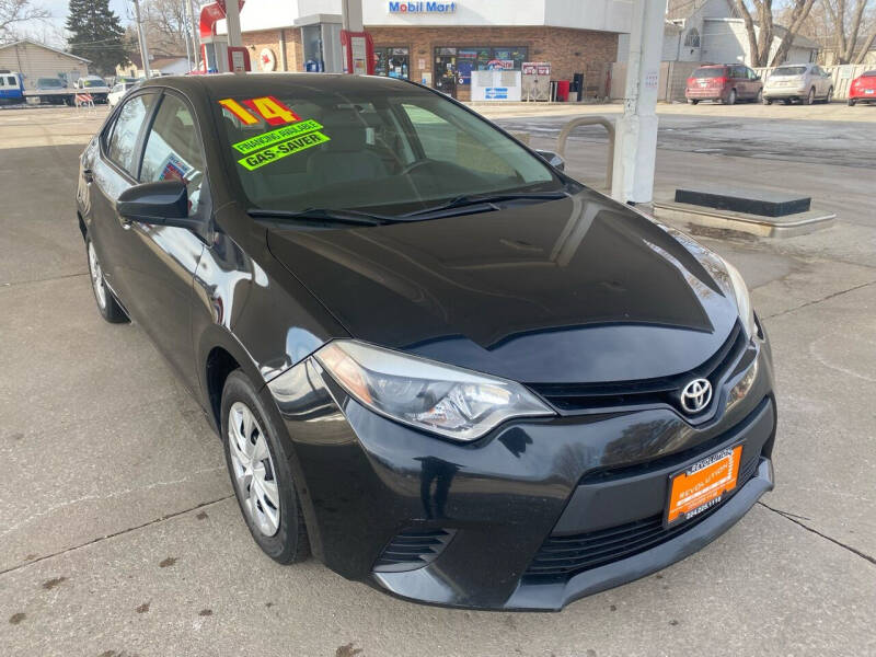 2014 Toyota Corolla for sale at REVOLUTION MOTORS LLC in Waukegan IL