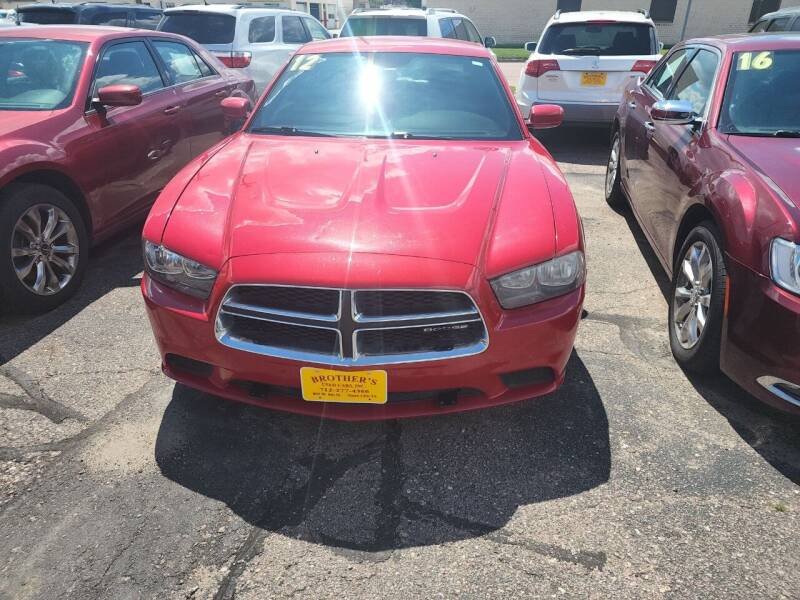 2012 Dodge Charger for sale at Brothers Used Cars Inc in Sioux City IA