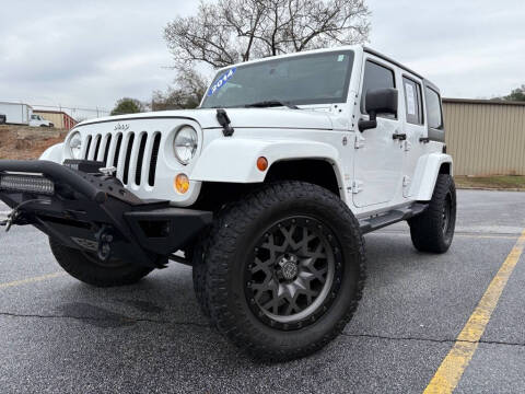 2014 Jeep Wrangler Unlimited for sale at 4 Brothers Auto Sales LLC in Brookhaven GA