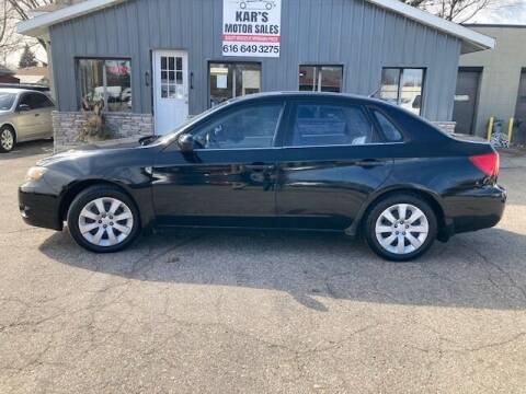 2009 Subaru Impreza for sale at KARS MOTORS in Wyoming MI