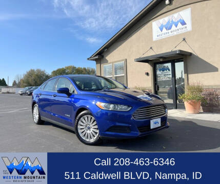 2015 Ford Fusion Hybrid for sale at Western Mountain Bus & Auto Sales in Nampa ID