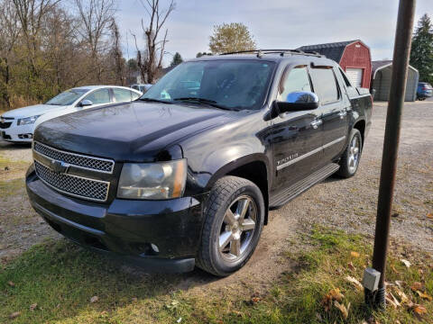 2011 Chevrolet Avalanche for sale at Clare Auto Sales, Inc. in Clare MI
