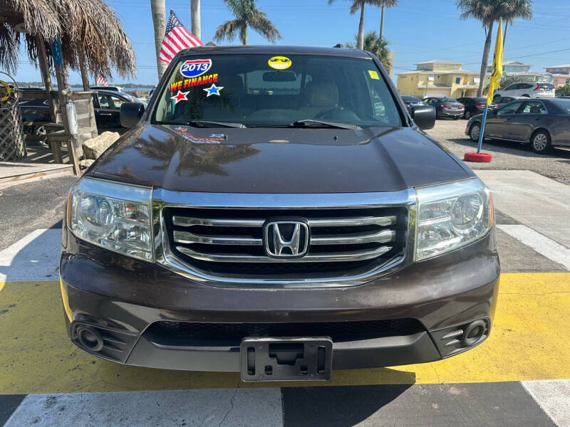 Used 2013 Honda Pilot LX with VIN 5FNYF4H24DB077928 for sale in Melbourne, FL