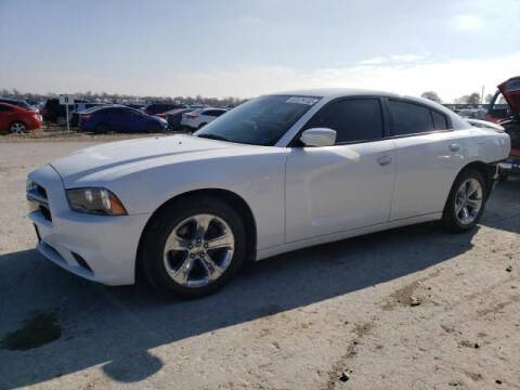 2013 Dodge Charger for sale at RAGINS AUTOPLEX in Kennett MO