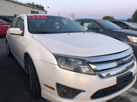 2011 Ford Fusion for sale at BELOW BOOK AUTO SALES in Idaho Falls ID
