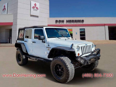 2012 Jeep Wrangler Unlimited for sale at DON HERRING MITSUBISHI in Irving TX