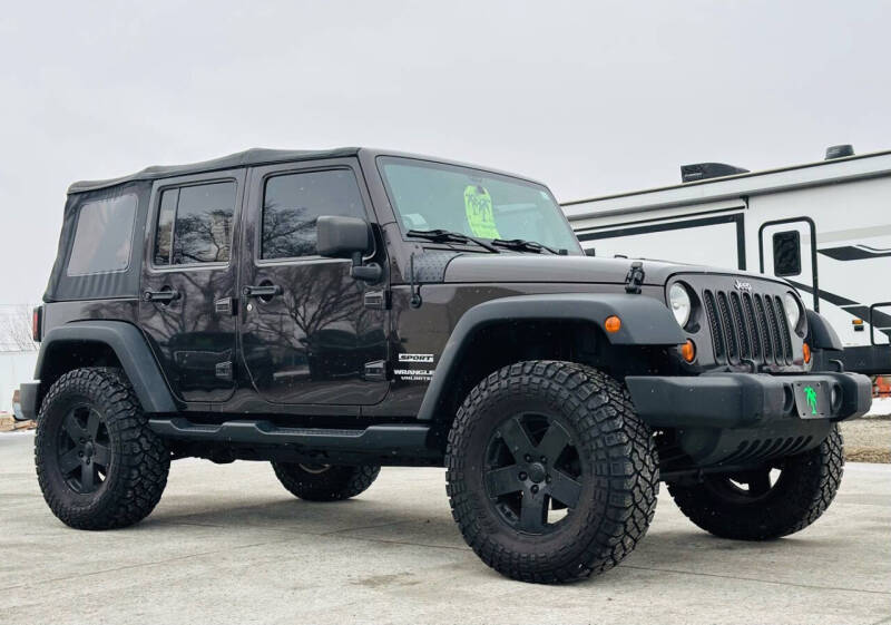 2013 Jeep Wrangler Unlimited for sale at Island Auto in Grand Island NE