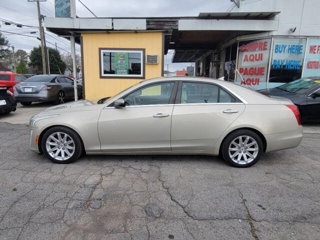 2014 Cadillac CTS for sale at DAGO'S AUTO SALES LLC in Dalton, GA