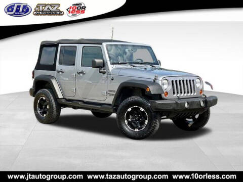 2013 Jeep Wrangler Unlimited for sale at J T Auto Group in Sanford NC